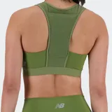 Top deportivo de mujer color verde oliva, corte ajustado, con escote redondo y banda elástica ancha en el bajo.