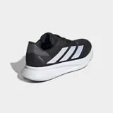 Championes de running Adidas Duramo SL 2, color negro con tres franjas laterales plateadas y entresuela blanca gruesa.