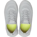 Championes Crocs Echo Surge de diseño deportivo y urbano. Presentan una parte superior de punto elástico en color verde militar con cordones tradicionales en tono celeste y blanco. Cuentan con una entresuela gruesa y exagerada de color beige con aberturas laterales y plantilla LiteRide.