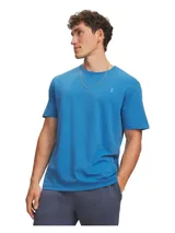 Remera Under Armour de manga corta color azul, con cuello redondo acanalado y logo bordado en el pecho.