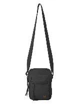 Bandolera Rip Curl Everyday Mini X Body color negro, con correa ajustable, bolsillo frontal con cierre y detalle de logo redondo en la parte inferior.