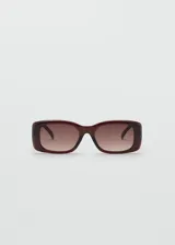 Lentes de sol Nimes con armazón rectangular de policarbonato en tono marrón oscuro y cristales degradados.