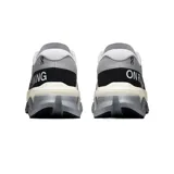 Championes de running On Running Cloudmonster 3 Hyper para hombre, color gris con suela gruesa con tecnología CloudTec y detalles en negro.