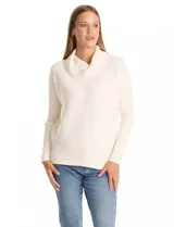 Buzo de tejido acanalado color blanco, con cuello alto y diseño de patrón en V en el frente. Presenta un corte holgado con mangas integradas sin costura de sisa.