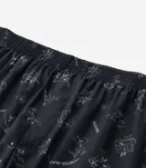 Calzoncillo tipo boxer de tela tricolina color azul marino con estampado de Spider-Man y cintura elástica.