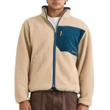 Buzo de polar tipo sherpa en color beige, con cierre frontal completo, cuello alto y bolsillo en el pecho de pana en color azul petróleo con cierre y logo bordado.