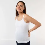 Camiseta de tirantes blanca diseñada para lactancia, con breteles ajustables y broches de apertura rápida. Confeccionada en algodón suave, presenta un corte ajustado y cómodo.
