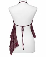 Top halter de tul transparente color negro, con bordado de lentejuelas y mostacillas en diseño de astros. Escote en V, bajo busto fruncido y ruedo asimétrico en pico con espalda descubierta.