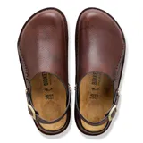 Zueco de cuero marrón oscuro, modelo Lutry Premium Lena de Birkenstock, con diseño cerrado en el empeine, tira ajustable en el talón con hebilla metálica y suela texturizada.