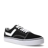 Championes urbanos Pony de corte bajo, color negro con detalles en blanco. Presentan el logo característico de la marca en el lateral, cordones blancos y suela de goma blanca con franja negra.