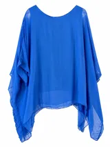 Blusa de seda italiana color azul francia, de corte holgado tipo poncho con escote redondo y musculosa integrada.