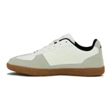 Championes Avia Kentaurus, color beige con detalles en negro y suela marrón.