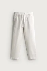 Pantalón relaxed fit de lino color negro, con cintura elástica ajustable con cordón y bolsillos frontales.