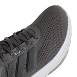 Championes de running Adidas modelo Ultrabounce, color gris oscuro con entresuela blanca y suela gris claro. Presentan diseño de malla transpirable, cordones al tono y las icónicas tres tiras laterales en material sintético.