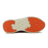 Championes deportivos para mujer, modelo Bresh de Diadora, en colores rojo, naranja, azul marino y blanco. Presentan una capellada de malla transpirable, detalles sintéticos y una suela gruesa de doble densidad en tonos crema y naranja.