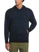 Buzo hoodie azul marino con estampado de hojas en tonos verde y azul. Tiene capucha con cordón ajustable, bolsillo tipo canguro y logo bordado en el pecho.