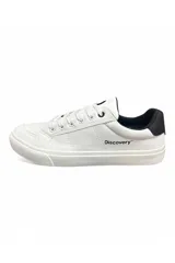 Championes deportivos Discovery modelo Casual Expedition, de color azul con cordones negros, suela blanca y detalles de la marca en el lateral.