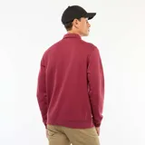 Buzo tipo remera de manga larga color rojo con cuello polo y bolsillo en el pecho.