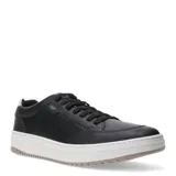 Zapatos urbanos Freeway de cuero negro con paneles laterales microperforados, cordones al tono y suela de goma blanca con detalle en relieve.