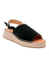 Sandalia de cuero negro estilo alpargata con plataforma revestida en yute trenzado, plantilla de cuero y tira ajustable en el talón con hebilla metálica.