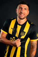 Camiseta de fútbol Puma del Club Atlético Peñarol, modelo Away Jersey Dandelion, color amarillo con finas líneas horizontales negras y detalles en negro en cuello y mangas. Incluye el logo de Puma, el escudo del club y el sponsor Antel en el frente.