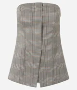 Blusa de sastrería sin breteles con estampado de cuadros, confeccionada en tejido estructurado con corte recto y bajo levemente evasé. Presenta un recorte delantero asimétrico y espalda con lastex para un ajuste preciso al cuerpo.