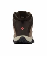 Bota de trekking Columbia modelo Crestwood Mid Waterproof, color marrón con detalles en rosa. Confeccionada con una combinación de cuero y malla, cuenta con tecnología impermeable Omni-Tech, entresuela TechLite para amortiguación y suela Omni-Grip para tracción en diversos terrenos.