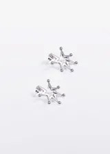 Par de caravanas de acero quirúrgico plateado, con forma de estrella y esferas en las puntas.