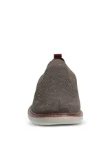 Zapato tipo slip on Hush Puppies modelo Apolo, confeccionado en tejido de poliéster color gris con refuerzo en el talón. Cuenta con suela de EVA Comfort Flex que brinda amortiguación y flexibilidad.