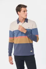 Remera tipo polo de manga larga con diseño de franjas horizontales en tonos azul marino, celeste, verde agua y gris. Presenta cuello clásico con cierre de botones y puños elásticos.