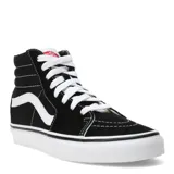 Championes Vans modelo Sk8-Hi de caña alta, color negro con la icónica banda lateral blanca. Confeccionados en una combinación de gamuza y lona, cuentan con suela de goma tipo waffle, punteras reforzadas y cuello acolchado para mayor comodidad.
