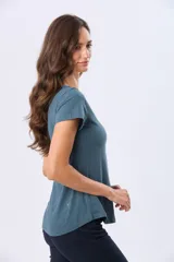 Remera de manga corta y cuello redondo, color verde menta jaspeado.