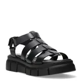 Sandalias de estilo gladiador con plataforma dentada, confeccionadas en cuero negro con tiras entrecruzadas y ajuste mediante velcro en el talón.