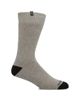 Medias de caña media en color taupe jaspeado, con puntera y talón reforzados en color negro. Presentan un tejido grueso y resistente, ideal para actividades al aire libre.