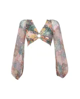 Top de bikini con estampado floral multicolor, escote en V con detalle de aro metálico y mangas largas abullonadas de tul.