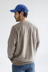 Sweater de plush color celeste.