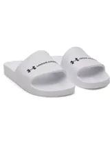 Sandalias Under Armour W Armr Slide Lite de color blanco, fabricadas en EVA moldeada de una sola pieza. Presentan una tira superior con textura en relieve y el logo de la marca en negro.