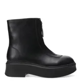 Botas Chelsea color blanco hueso con plataforma y cierre frontal con cremallera.