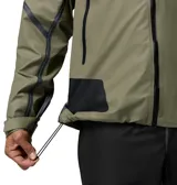 Campera impermeable Columbia modelo Whistler Peak Shell Outdry, de color verde militar con inserciones negras en hombros y codos. Cuenta con capucha ajustable, cierre frontal y bolsillos con cremalleras selladas, y tecnología OutDry Extreme.