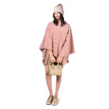 Poncho de textura suave y diseño acanalado en color rosado, con corte amplio y holgado.