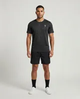 Remera deportiva de manga corta y cuello redondo de la marca Tiffosi, en color negro con sutil estampado geométrico y logo blanco en el pecho.