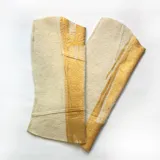 Polainas de lana afieltrada teñida artesanalmente y estampada.