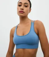 Top deportivo Get Over de poliamida seamless, con escote redondo, breteles cruzados en la espalda y diseño sin costuras.