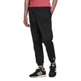 Pantalón de jogging negro con cintura elástica ajustable con cordón, bolsillos laterales y logo de Adidas bordado en la pierna izquierda.