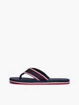 Ojotas Tommy Hilfiger con base azul marino y tiras de poliéster con el logo de la marca en blanco y rojo.