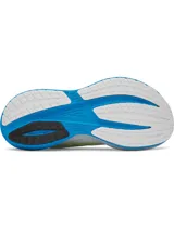 Championes de running Under Armour modelo Velociti Distance, con tecnología de amortiguación HOVR+ en la entresuela. Presentan un diseño en color blanco con detalles en azul vibrante y amarillo neón, con capellada de malla técnica transpirable.