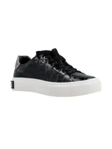 Championes negros de cuero con textura simil cocodrilo, cordones negros y suela blanca de plataforma plana.