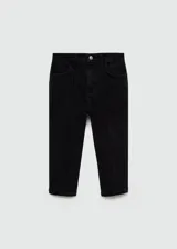 Pantalón tipo capri de denim negro con corte skinny, tiro medio, cierre de cremallera y botón, y costuras decorativas verticales en el frente.