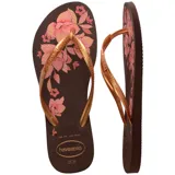 Sandalias Havaianas Slim Organic de color marrón café, con tiras finas doradas y estampado floral en tonos rosados sobre la base.