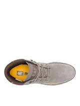 Bota Caterpillar modelo Pursue, color gris carbón, con capellada de nobuk y gamuza. Cuenta con suela inspirada en tractores Caterpillar, entresuela de EVA, amortiguación en el talón y cuello acolchado.